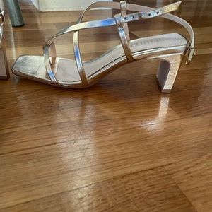 Size 6.5 Shutz gold heels